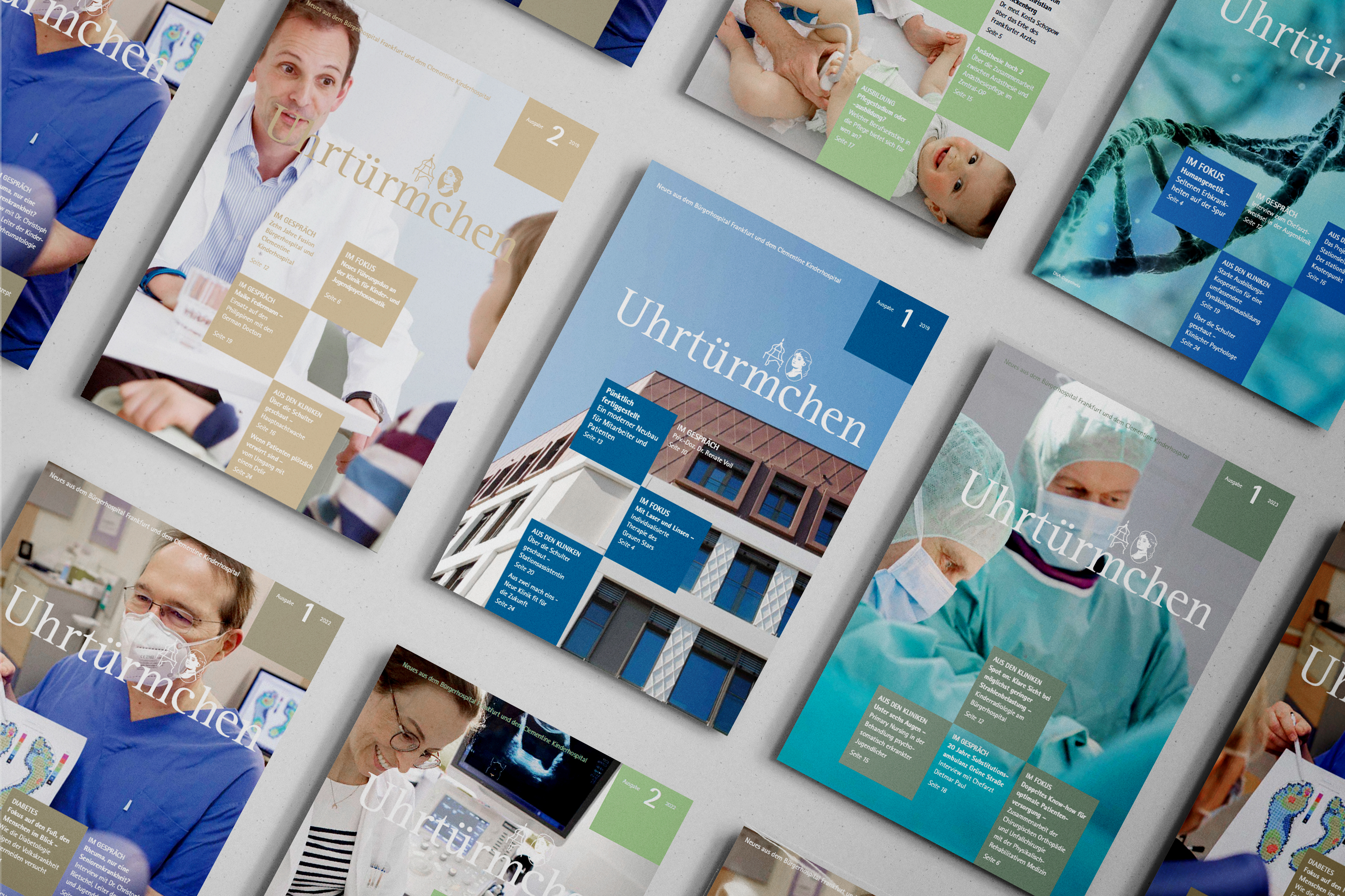 Das Bild zeigt mehrere Cover des Magazins "Uhrtürmchen" in Reihen angeordnet.